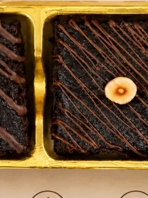 A wheat brownie in a gold tray